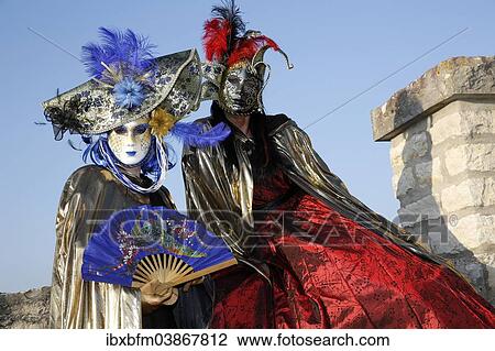 Two women wearing Venetian masks and costumes View Large Photo Image Stock Image - Two women wearing Venetian masks and costumes. Fotosearch