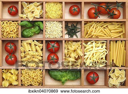 "Type case with pasta, basil and tomatoes" View Large Photo Image Stock Photo - "Type case with pasta, basil and tomatoes". Fotosearch