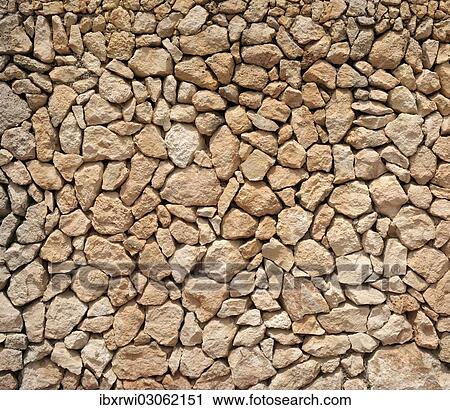 Typical Balearic dry stone wall made of yellow and red boulders View Large Photo Image Stock Image - Typical Balearic dry stone wall made of yellow and red boulders. Fotosearch
