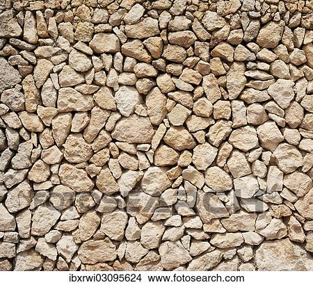 "Typical Balearic dry stone wall with red-brown rocks, Balearic Islands, Spain, Europe" View Large Photo Image Picture - "Typical Balearic dry stone wall with red-brown rocks, Balearic Islands, Spain, Europe". Fotosearch
