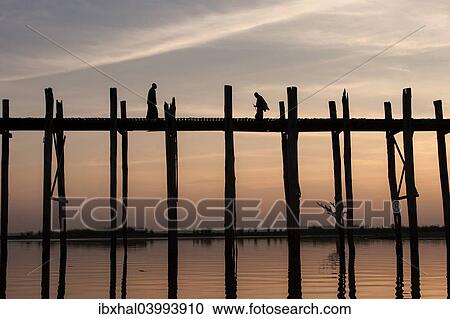 "U Bein Bridge in the evening light, near Mandalay, Myanmar, Asia" View Large Photo Image Stock Image - "U Bein Bridge in the evening light, near Mandalay, Myanmar, Asia". Fotosearch