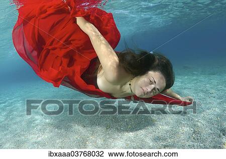 "Underwater model presenting fashion in the sea, Greece, Europe" View Large Photo Image Stock Image - "Underwater model presenting fashion in the sea, Greece, Europe". Fotosearch