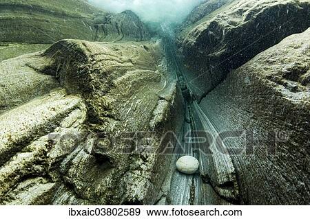 "Underwater view of a waterfall in the Verzasca River, Lavertezzo, Valle Verzasca, Canton Ticino, Switzerland, Europe" View Large Photo Image Stock Photo - "Underwater view of a waterfall in the Verzasca River, Lavertezzo, Valle Verzasca, Canton Ticino, Switzerland, Europe". Fotosearch