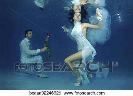 Stock Photography - "Underwater wedding in pool, Odessa, Ukraine, Eastern Europe, Europe". Fotosearch