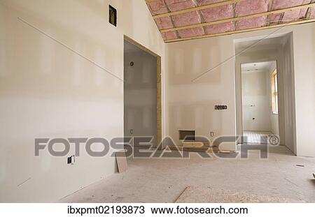 Stock Image - "Unfinished room and bathroom in a residential home, Quebec, Canada, North America". Fotosearch