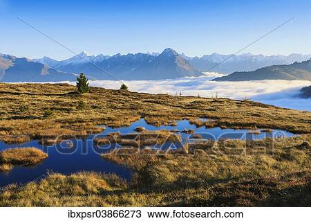 "Upland moor above a layer of fog, Tyrol, Austria, Europe" View Large Photo Image Stock Image - "Upland moor above a layer of fog, Tyrol, Austria, Europe". Fotosearch