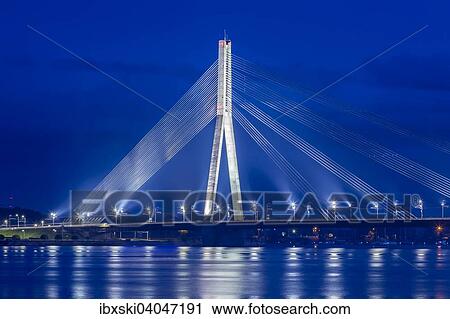 "Vansu Bridge, cable-stayed bridge, dusk, blue hour, over the Daugava river or Western Dvina, Riga, Latvia, Europe" View Large Photo Image Stock Image - "Vansu Bridge, cable-stayed bridge, dusk, blue hour, over the Daugava river or Western Dvina, Riga, Latvia, Europe". Fotosearch