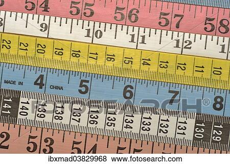 Various colourful measuring tapes View Large Photo Image Stock Photo - Various colourful measuring tapes. Fotosearch