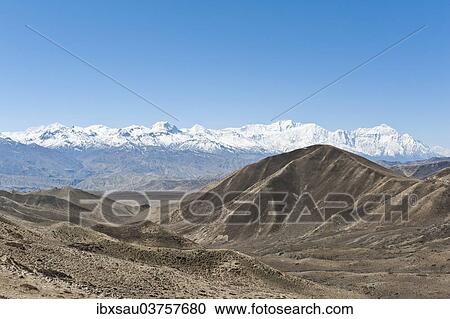 "Vast landscape with the snow-covered mountains of the Annapurna Range at back, near Lo Manthang, Upper Mustang, Lo, Nepal, Asia" View Large Photo Image Stock Image - "Vast landscape with the snow-covered mountains of the Annapurna Range at back, near Lo Manthang, Upper Mustang, Lo, Nepal, Asia". Fotosearch