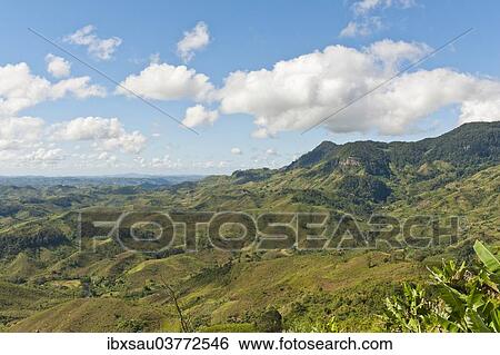 Stock Photograph - "Vast mountainous, largely deforested landscape, near Manakara, Madagascar, Africa". Fotosearch