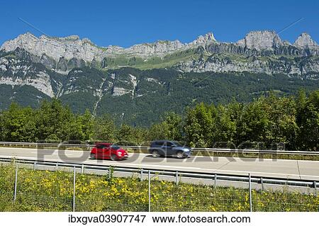 "Vehicles on the A3 motorway in front of the Churfirsten range near Lake Walen, Canton of St. Gallen, Switzerland, Europe" View Large Photo Image Stock Photo - "Vehicles on the A3 motorway in front of the Churfirsten range near Lake Walen, Canton of St. Gallen, Switzerland, Europe". Fotosearch