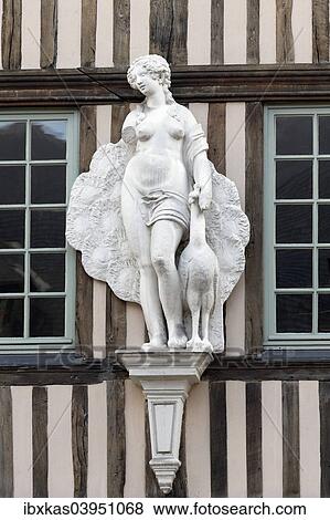 "Venus with a peacock, decorative figure on the facade of a Norman half-timbered house, Rouen, Seine-Maritime, Upper Normandy, France, Europe" View Large Photo Image Stock Photo - "Venus with a peacock, decorative figure on the facade of a Norman half-timbered house, Rouen, Seine-Maritime, Upper Normandy, France, Europe". Fotosearch