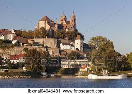 Stock Image - "View across river Rhine to the Munsterberg hill with St. Stephansmunster cathedral, Breisach am Rhein, Kaiserstuhl, Breisgau, Black Forest, Baden-Wurttemberg, Germany, Europe". Fotosearch