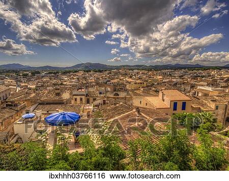 "View across roofs of Arta, Arta, Majorca, Balearic Islands, Spain, Europe" View Large Photo Image Stock Photograph - "View across roofs of Arta, Arta, Majorca, Balearic Islands, Spain, Europe". Fotosearch
