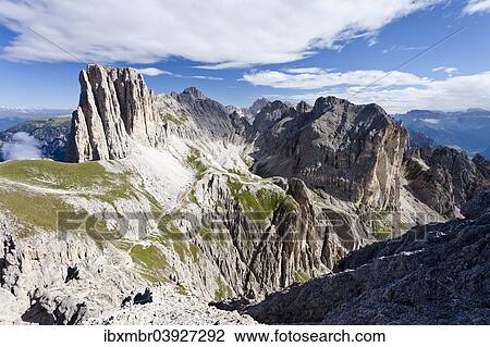 "View during the ascent to the Croda Rossa in the Rose Garden Group over the Croda Rossa via ferrata, below the Vaiolonpass, behind the Tscheiner tips and the Rosengarten group with Kesselkogel, Dolomites, Province of South Tyrol, Italy, Europe" View Large Photo Image Stock Image - "View during the ascent to the Croda Rossa in the Rose Garden Group over the Croda Rossa via ferrata, below the Vaiolonpass, behind the Tscheiner tips and the Rosengarten group with Kesselkogel, Dolomites, Province of South Tyrol, Italy, Europe". Fotosearch