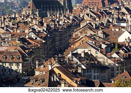 Stock Photography - "View from above over the red-tiled roofs of the houses in the historic town center of Bern, Switzerland, Europe". Fotosearch