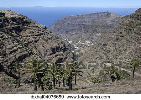 "View from El Cercado on the Valle Gran Rey, behind the Atlanic Ocean and the island of El Hierro, La Gomera, Canary Islands, Spain, Europe" View Large Photo Image Stock Photo - "View from El Cercado on the Valle Gran Rey, behind the Atlanic Ocean and the island of El Hierro, La Gomera, Canary Islands, Spain, Europe". Fotosearch