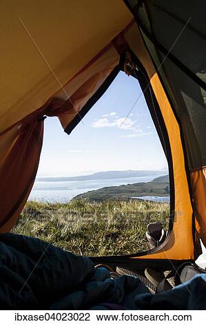 Stock Image - "View from inside tent looking across Sound of Raasay, Isle of Skye, Scotland, United Kingdom, Europe". Fotosearch