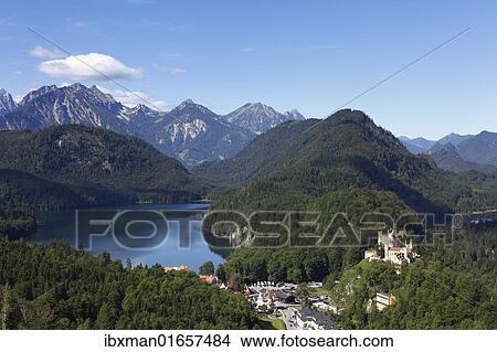 "View from Jugend lookout point over Lake Alpsee and Schloss Hohenschwangau Castle towards the Tannheimer Mountains, Ostallgaeu, Allgaeu, Schwaben, Bavaria, Germany, Europe" View Large Photo Image Picture - "View from Jugend lookout point over Lake Alpsee and Schloss Hohenschwangau Castle towards the Tannheimer Mountains, Ostallgaeu, Allgaeu, Schwaben, Bavaria, Germany, Europe". Fotosearch