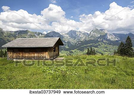 Stock Photo - "View from Klangweg or Sound Trail on Toggenburg Mountain towards the Alpstein Mountains with Saentis Mountain, Wildhaus, Canton of St. Gallen, Switzerland, Europe". Fotosearch