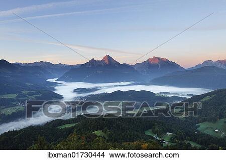 "View from Kneifelspitze mountain across Berchtesgaden towards Watzmann and Hochkalter mountains, in the morning, Berchtesgaden Alps, Berchtesgadener Land district, Upper Bavaria, Germany, Europe" View Large Photo Image Picture - "View from Kneifelspitze mountain across Berchtesgaden towards Watzmann and Hochkalter mountains, in the morning, Berchtesgaden Alps, Berchtesgadener Land district, Upper Bavaria, Germany, Europe". Fotosearch
