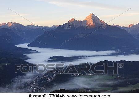 "View from Kneifelspitze mountain across Berchtesgaden towards Watzmann mountain, in the morning, Berchtesgaden Alps, Berchtesgaden, Upper Bavaria, Germany, Europe" View Large Photo Image Stock Photograph - "View from Kneifelspitze mountain across Berchtesgaden towards Watzmann mountain, in the morning, Berchtesgaden Alps, Berchtesgaden, Upper Bavaria, Germany, Europe". Fotosearch