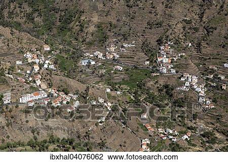 "View from Mirador Cesar Manrique onto terraced fields and houses of Lomo del Balo and La Vizcaina, Valle Gran Rey, La Gomera, Canary Islands, Spain, Europe" View Large Photo Image Stock Image - "View from Mirador Cesar Manrique onto terraced fields and houses of Lomo del Balo and La Vizcaina, Valle Gran Rey, La Gomera, Canary Islands, Spain, Europe". Fotosearch