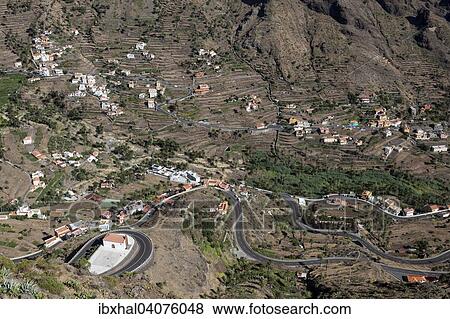 "View from Mirador Cesar Manrique onto terraced fields and houses of Lomo del Balo and La Vizcaina, Valle Gran Rey, La Gomera, Canary Islands, Spain, Europe" View Large Photo Image Stock Photo - "View from Mirador Cesar Manrique onto terraced fields and houses of Lomo del Balo and La Vizcaina, Valle Gran Rey, La Gomera, Canary Islands, Spain, Europe". Fotosearch