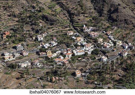 "View from Mirador Cesar Manrique onto terraced fields and houses of Los Reyes, Valle Gran Rey, La Gomera, Canary Islands, Spain, Europe" View Large Photo Image Stock Photo - "View from Mirador Cesar Manrique onto terraced fields and houses of Los Reyes, Valle Gran Rey, La Gomera, Canary Islands, Spain, Europe". Fotosearch