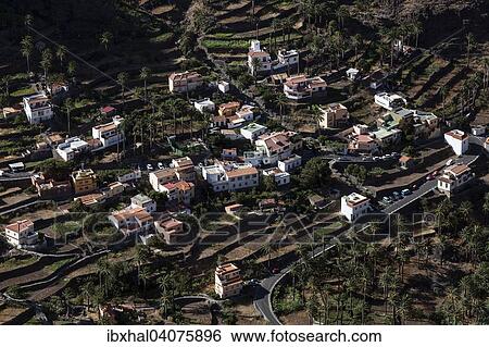 "View from Mirador Cesar Manrique onto terraced fields and houses of Los Reyes, Valle Gran Rey, La Gomera, Canary Islands, Spain, Europe" View Large Photo Image Stock Photograph - "View from Mirador Cesar Manrique onto terraced fields and houses of Los Reyes, Valle Gran Rey, La Gomera, Canary Islands, Spain, Europe". Fotosearch
