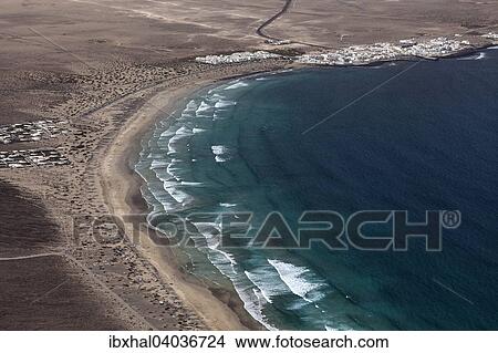 "View from Mirador del Bosquecillo, Risco de Famara, on Famara beach or Playa de Famara with La Calaeta and Famara resort, Lanzarote, Canary Islands, Spain, Europe" View Large Photo Image Picture - "View from Mirador del Bosquecillo, Risco de Famara, on Famara beach or Playa de Famara with La Calaeta and Famara resort, Lanzarote, Canary Islands, Spain, Europe". Fotosearch