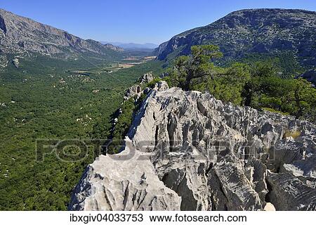 "View from Monte Tiscali on the Lanaittu Valley, Gennargentu National Park, Supramonte, Province of Nuoro, Sardinia, Italy, Europe" View Large Photo Image Stock Image - "View from Monte Tiscali on the Lanaittu Valley, Gennargentu National Park, Supramonte, Province of Nuoro, Sardinia, Italy, Europe". Fotosearch