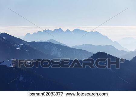 "View from Mt Wallberg, Mt Wilder Kaiser in Tyrol at back, Upper Bavaria, Bavaria, Germany, Europe, PublicGround, Europe" View Large Photo Image Stock Photo - "View from Mt Wallberg, Mt Wilder Kaiser in Tyrol at back, Upper Bavaria, Bavaria, Germany, Europe, PublicGround, Europe". Fotosearch