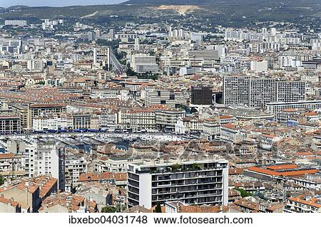 "View from Notre-Dame de la Garde across the city, Marseille, Bouches-du-Rhone, Provence-Alpes-Cote d'Azur, France, Europe" View Large Photo Image Stock Photo - "View from Notre-Dame de la Garde across the city, Marseille, Bouches-du-Rhone, Provence-Alpes-Cote d'Azur, France, Europe". Fotosearch