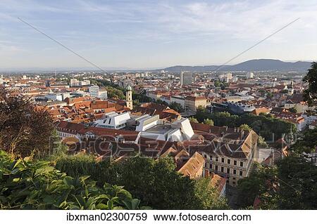 Stock Photo - "View from Schlossberg, castle hill, Franciscan Church and Cafe Lounge in the roof of Kastner and Oehler, Graz, Stryria, Europe, PublicGround". Fotosearch