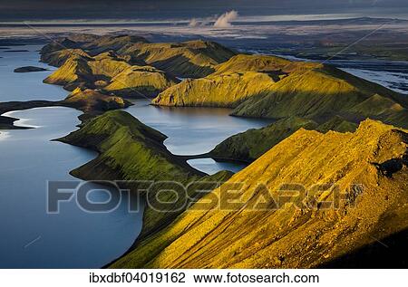 "View from Sveinstindur mountain on Lake Langisjor, behind the Vatnajokull glacier, Highlands Region, Iceland, Europe" View Large Photo Image Stock Image - "View from Sveinstindur mountain on Lake Langisjor, behind the Vatnajokull glacier, Highlands Region, Iceland, Europe". Fotosearch