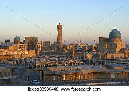 "View from the Ark Fortress of the historic centre with the Mir-i-Arab Madrasah and the Kalon Mosque, Bukhara, Uzbekistan, Asia" View Large Photo Image Stock Photo - "View from the Ark Fortress of the historic centre with the Mir-i-Arab Madrasah and the Kalon Mosque, Bukhara, Uzbekistan, Asia". Fotosearch