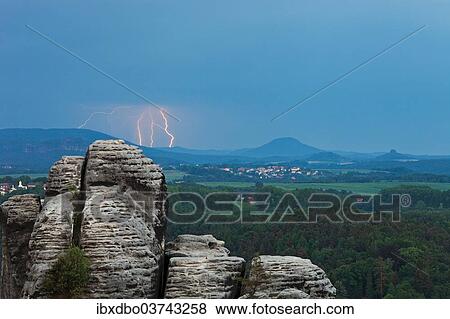 "View from the Bastei rock formation, thunderstorm, Saxon Switzerland National Park, Saxon Switzerland region, Saxony, Germany, Europe" View Large Photo Image Stock Photo - "View from the Bastei rock formation, thunderstorm, Saxon Switzerland National Park, Saxon Switzerland region, Saxony, Germany, Europe". Fotosearch