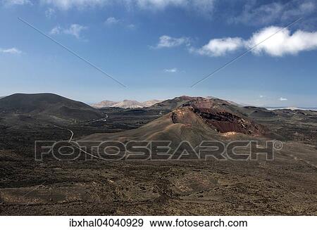 "View from the Caldera Blanca volcano on the volcanic landscape of the Timanfaya National Park, Fire Mountains, volcanoes, Lanzarote, Canary Islands, Spain, Europe" View Large Photo Image Stock Photo - "View from the Caldera Blanca volcano on the volcanic landscape of the Timanfaya National Park, Fire Mountains, volcanoes, Lanzarote, Canary Islands, Spain, Europe". Fotosearch