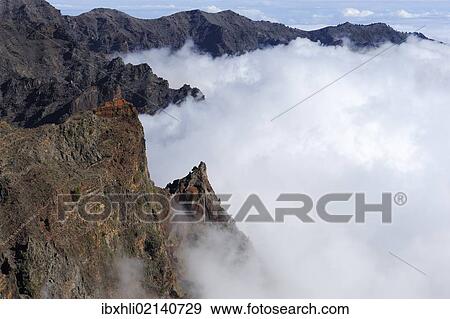 "View from the caldera rim over a sea of clouds in the Caldera de Taburiente National Park, La Palma, Canary Islands, Spain, Europe, PublicGround, Europe" View Large Photo Image Stock Photo - "View from the caldera rim over a sea of clouds in the Caldera de Taburiente National Park, La Palma, Canary Islands, Spain, Europe, PublicGround, Europe". Fotosearch