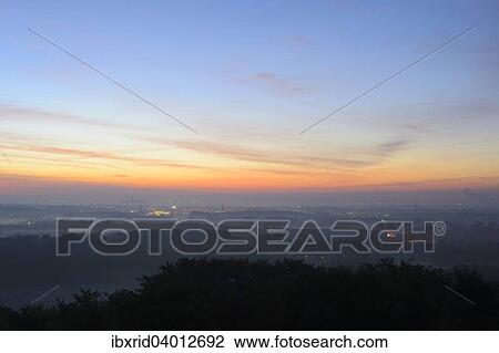 "View from the Halde Norddeutschland spoil tip onto the Lower Rhine and the western Ruhr district at dawn, Neukirchen, North Rhine-Westphalia, Germany, Europe" View Large Photo Image Stock Image - "View from the Halde Norddeutschland spoil tip onto the Lower Rhine and the western Ruhr district at dawn, Neukirchen, North Rhine-Westphalia, Germany, Europe". Fotosearch