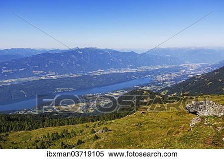 Stock Photography - "View from the Millstatt Alps over Lake Millstatt, Millstatter Alpe massif, Central Eastern Alps, Millstatt am See, Spittal an der Drau, Carinthia, Austria, Europe". Fotosearch
