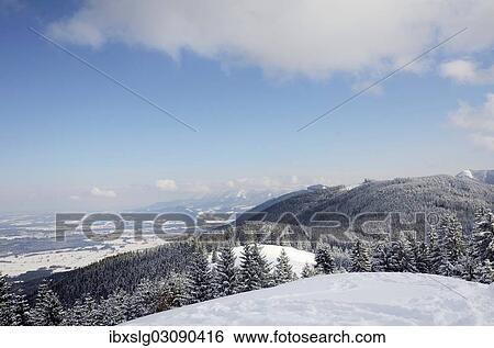"View from the peak of Mt Schwarzenberg to a snow-covered on snow-covered alpine upland and the Chiemgau Alps, Leitzachtal, bei Elbach, Upper Bavaria, Bavaria, Germany, Europe" View Large Photo Image Stock Photograph - "View from the peak of Mt Schwarzenberg to a snow-covered on snow-covered alpine upland and the Chiemgau Alps, Leitzachtal, bei Elbach, Upper Bavaria, Bavaria, Germany, Europe". Fotosearch