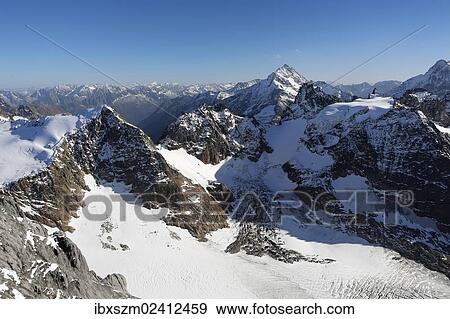 Stock Photo - "View from Titlis Mountain towards the Central Swiss Alps, Obwalden, Switzerland, Europe". Fotosearch