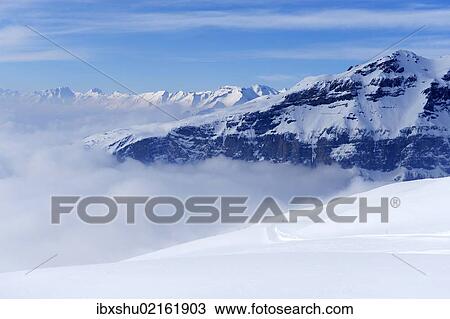 "View from Torrenthorn Mountain over the fog shrouded Valais Alps, Leukerbad, Valais, Switzerland, Europe" View Large Photo Image Stock Image - "View from Torrenthorn Mountain over the fog shrouded Valais Alps, Leukerbad, Valais, Switzerland, Europe". Fotosearch