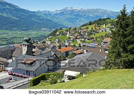 Stock Image - "View from Triesenberg over the Rhine Valley towards the Alpstein Mountains, Principality of Liechtenstein". Fotosearch