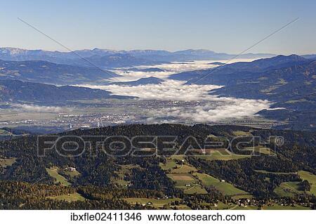 "View from Zirbitzkogel mountain across the valley towards Obdach, Seetal Alps, Styria, Austria, Europe" View Large Photo Image Stock Photograph - "View from Zirbitzkogel mountain across the valley towards Obdach, Seetal Alps, Styria, Austria, Europe". Fotosearch