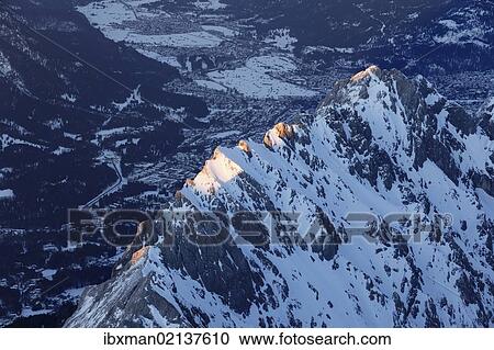 "View from Zugspitze Mountain over Waxenstein Mountain towards Garmisch-Partenkirchen, Wetterstein Mountains, Upper Bavaria, Bavaria, Germany, Europe" View Large Photo Image Stock Image - "View from Zugspitze Mountain over Waxenstein Mountain towards Garmisch-Partenkirchen, Wetterstein Mountains, Upper Bavaria, Bavaria, Germany, Europe". Fotosearch