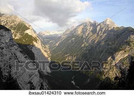 "View of a mountain valley, Reintal valley with the Partnach mountain river, Mt. Zugspitze, Mt. Alpspitze, Wettersteingebirge mountain range, Upper Bavaria, Bavaria, Germany, Europe" View Large Photo Image Stock Image - "View of a mountain valley, Reintal valley with the Partnach mountain river, Mt. Zugspitze, Mt. Alpspitze, Wettersteingebirge mountain range, Upper Bavaria, Bavaria, Germany, Europe". Fotosearch