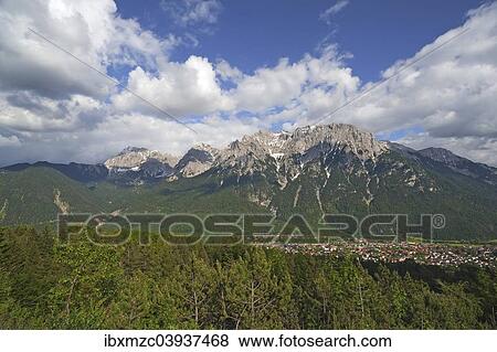 "View of Mittenwald with the Karwendel mountain range, Mittenwald, Bavaria, Germany, Europe" View Large Photo Image Stock Photo - "View of Mittenwald with the Karwendel mountain range, Mittenwald, Bavaria, Germany, Europe". Fotosearch
